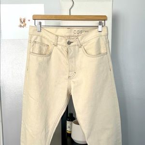Mid-rise tapered leg crème pants